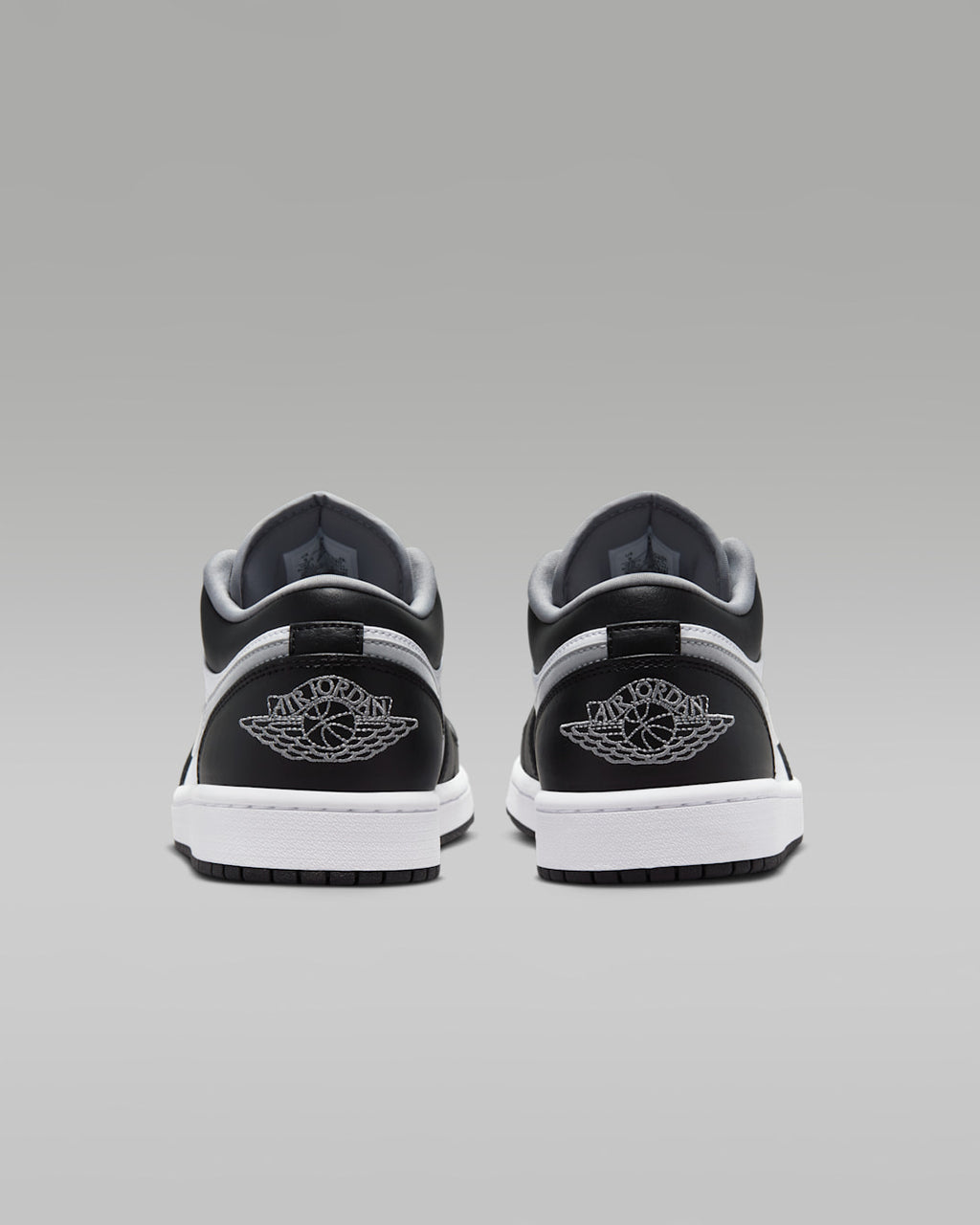 Air Jordan 1 Low Black, White & Silver Sneakers